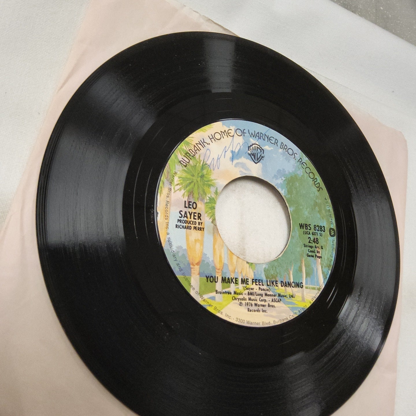 45 double sided record Leo Sayer "You make me feel like dancing" and "Magdalena" Warner bros records