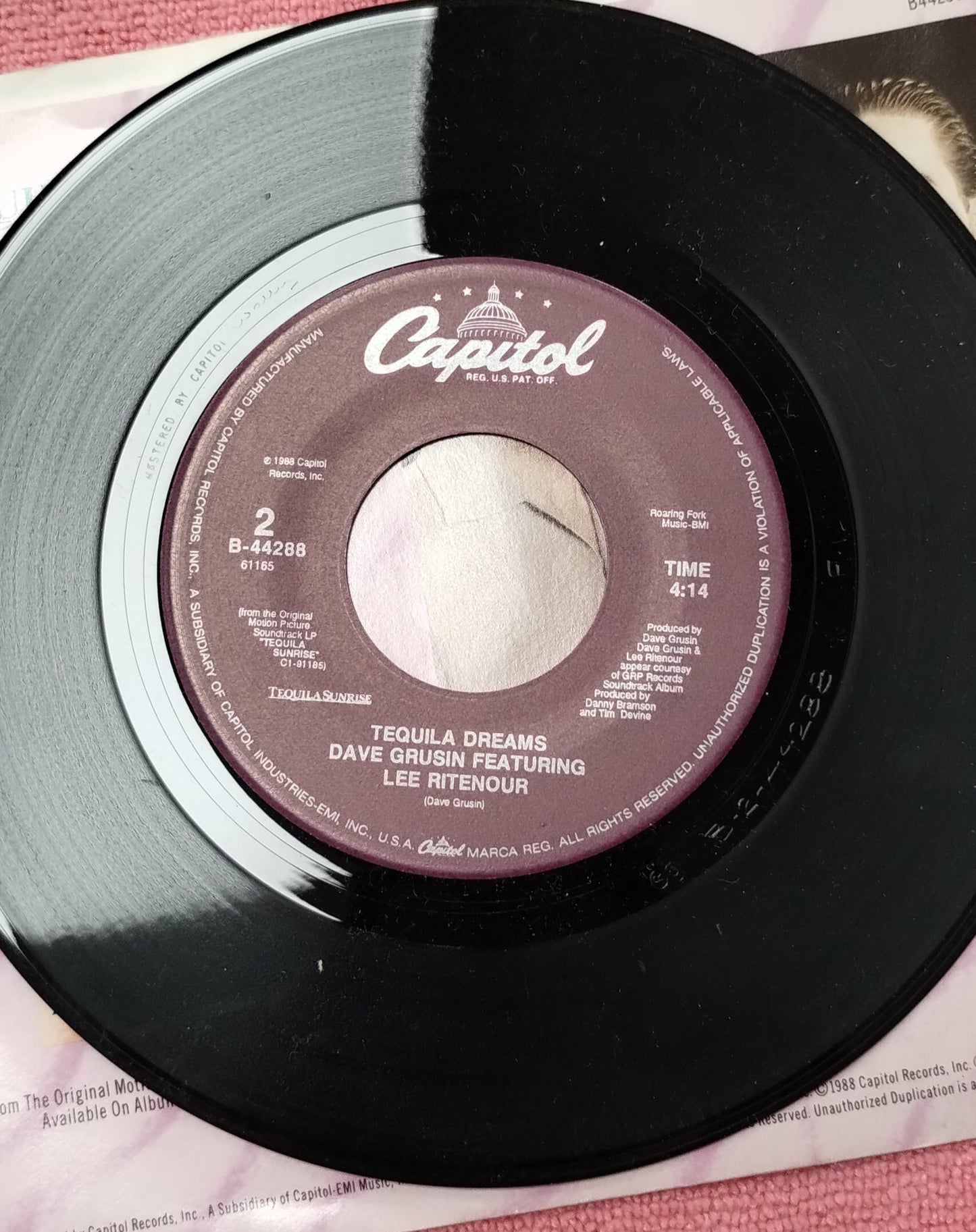45 double sided Tequila Sunrise record "Surrender to me featuring Ann Wilson and Robin Zander" and "Tequila dreams featuring Dave Grusin and Lee Ritenour"