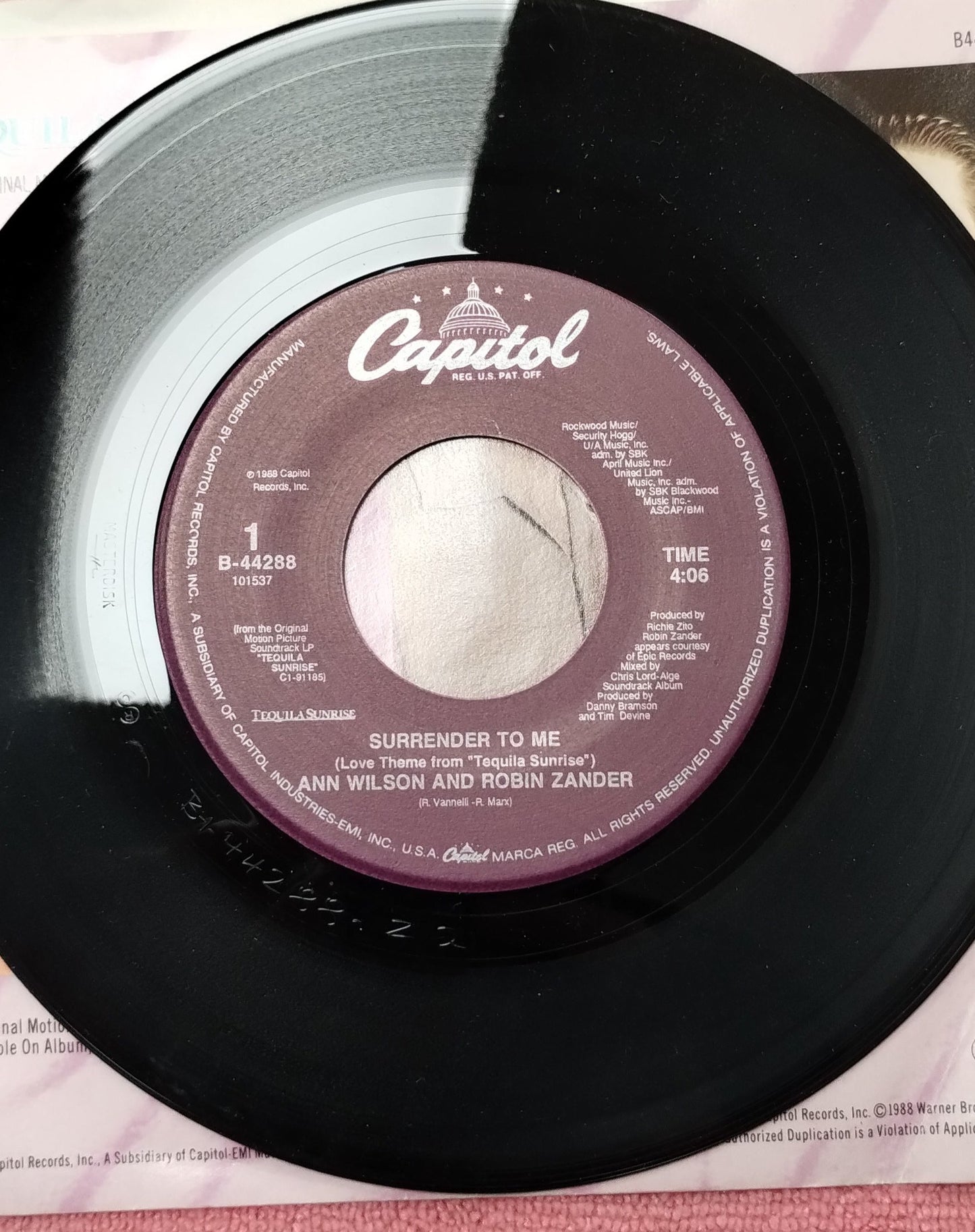 45 double sided Tequila Sunrise record "Surrender to me featuring Ann Wilson and Robin Zander" and "Tequila dreams featuring Dave Grusin and Lee Ritenour"