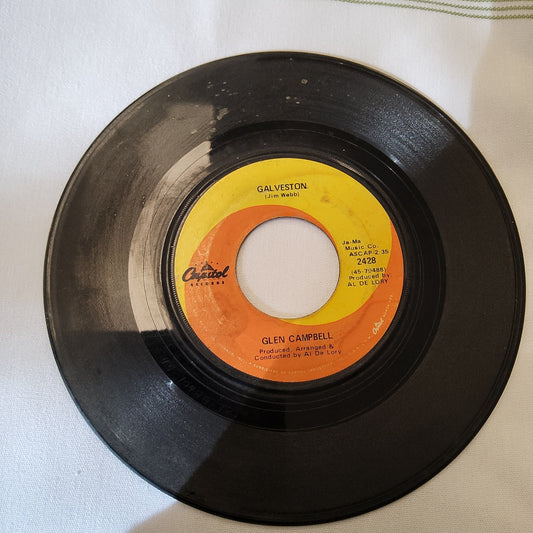 45 double sided record by Glenn Campbell "Galveston" and "How come every time I itch I wind up scratchin you"