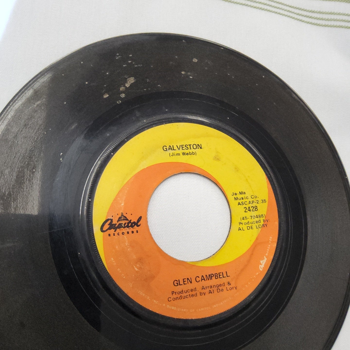 45 double sided record by Glenn Campbell "Galveston" and "How come every time I itch I wind up scratchin you"