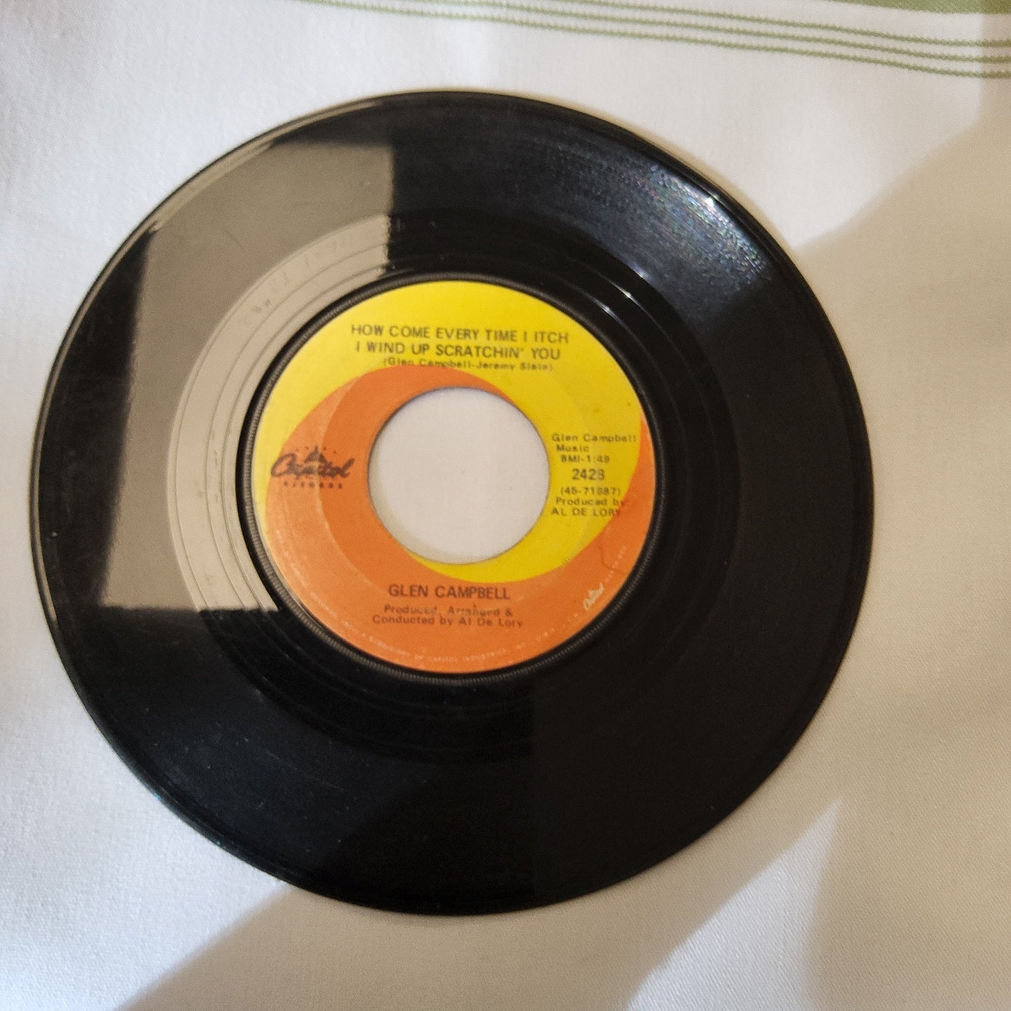 45 double sided record by Glenn Campbell "Galveston" and "How come every time I itch I wind up scratchin you"