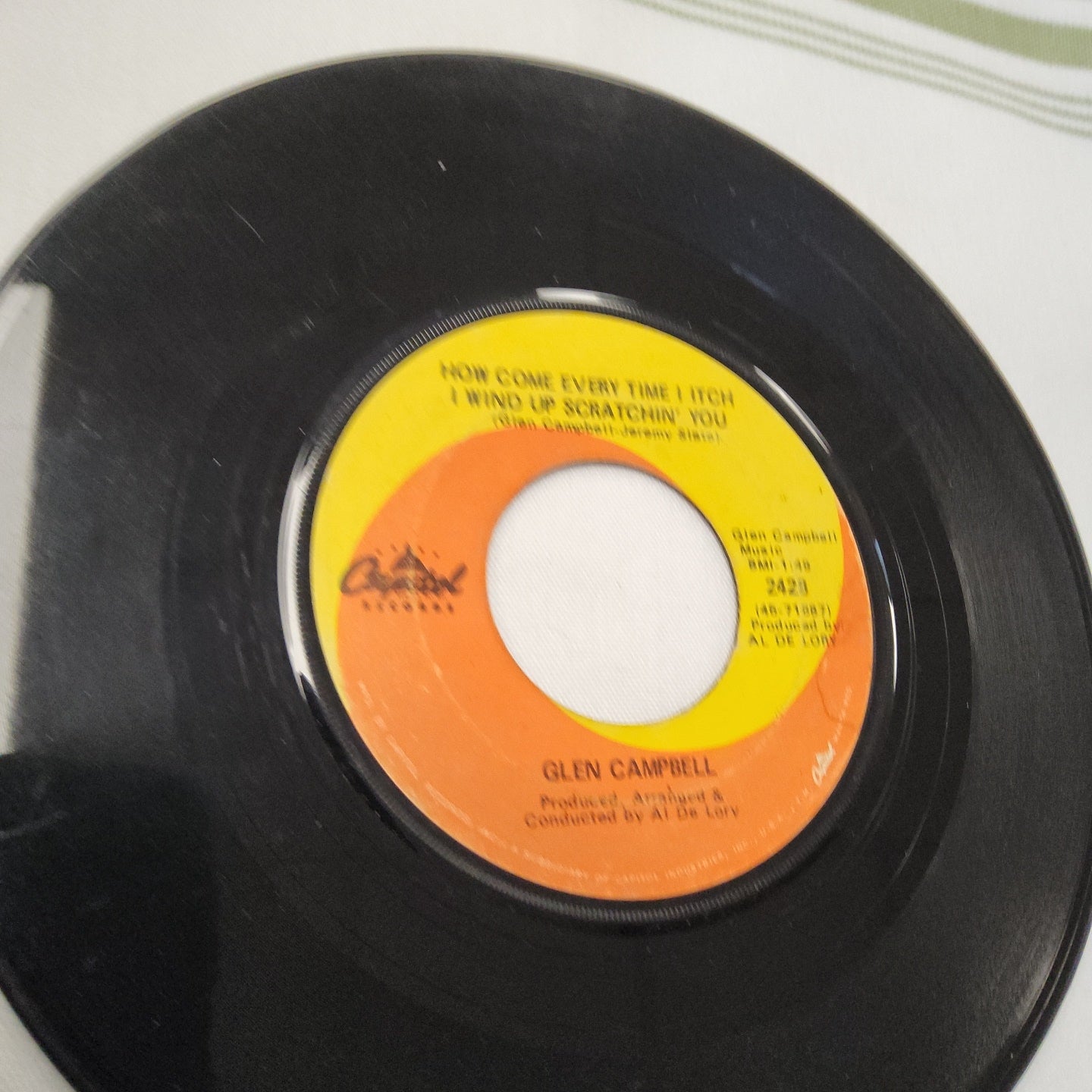 45 double sided record by Glenn Campbell "Galveston" and "How come every time I itch I wind up scratchin you"