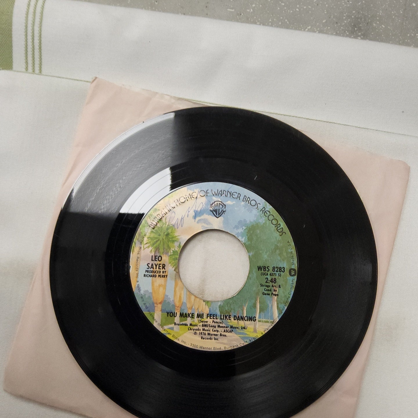 45 double sided record Leo Sayer "You make me feel like dancing" and "Magdalena"  Warner bros records