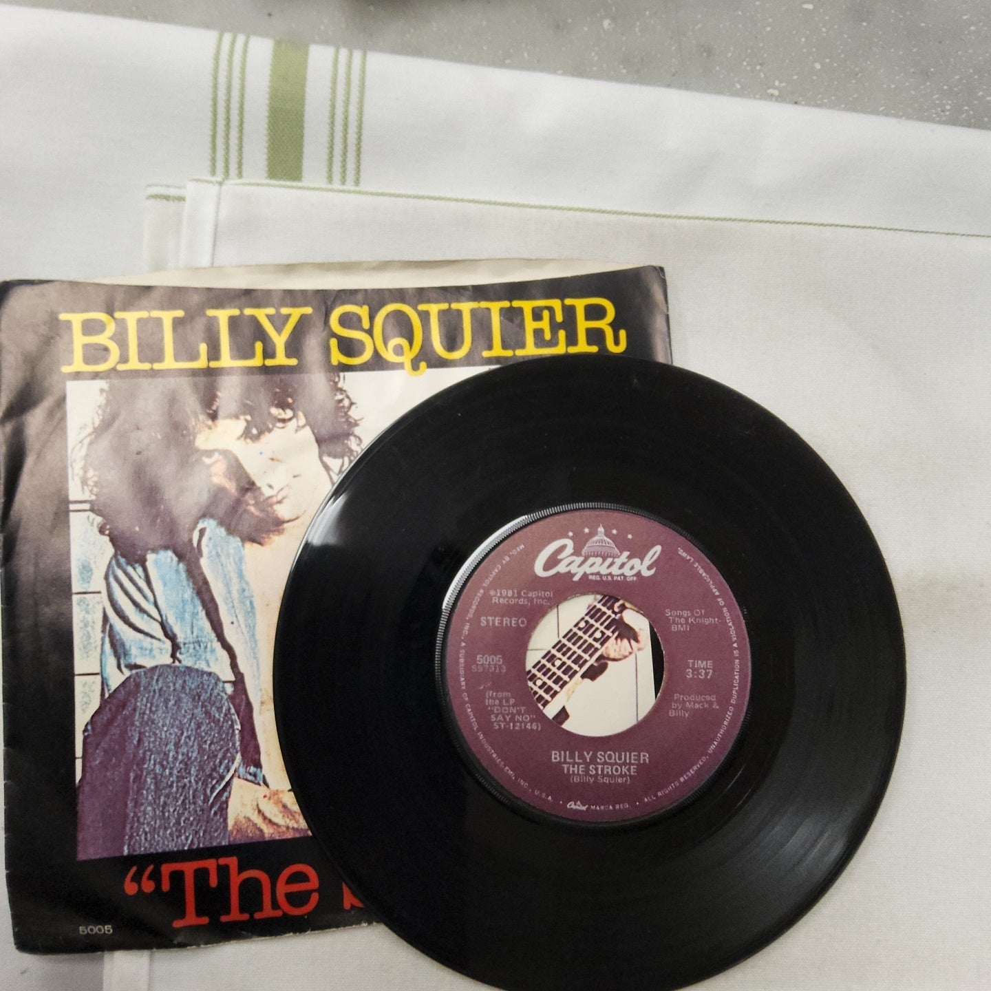 45 double sided record Billy Squier "The Stroke" and "Too daze gone"