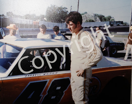 Darrell Waltrip standing near car #48 Nascar Photo Print