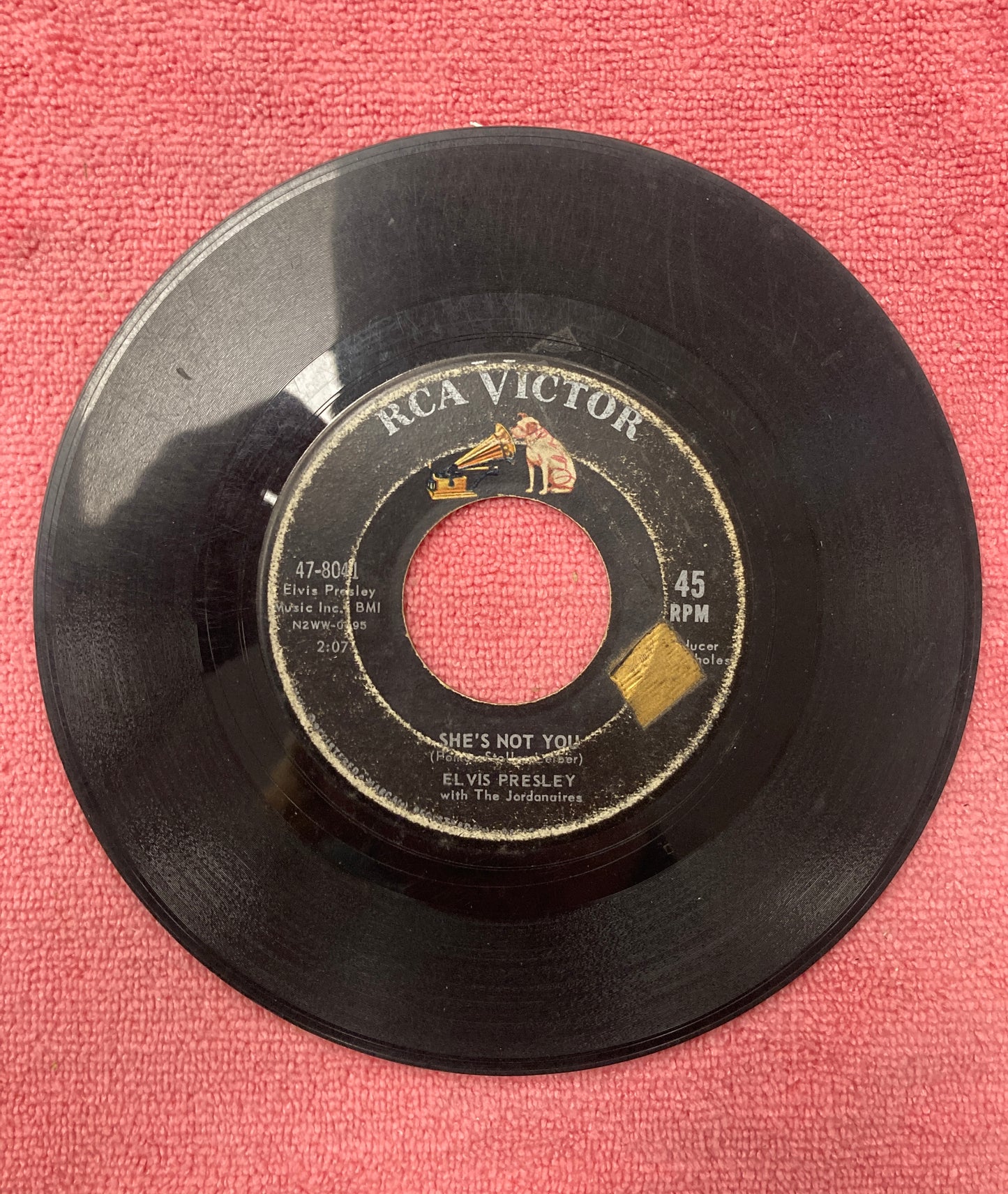 45 double sided record Elvis Presley "She's not you" and "Just tell her Jim said hello"