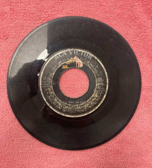 45 double sided record Elvis Presley "She's not you" and "Just tell her Jim said hello"