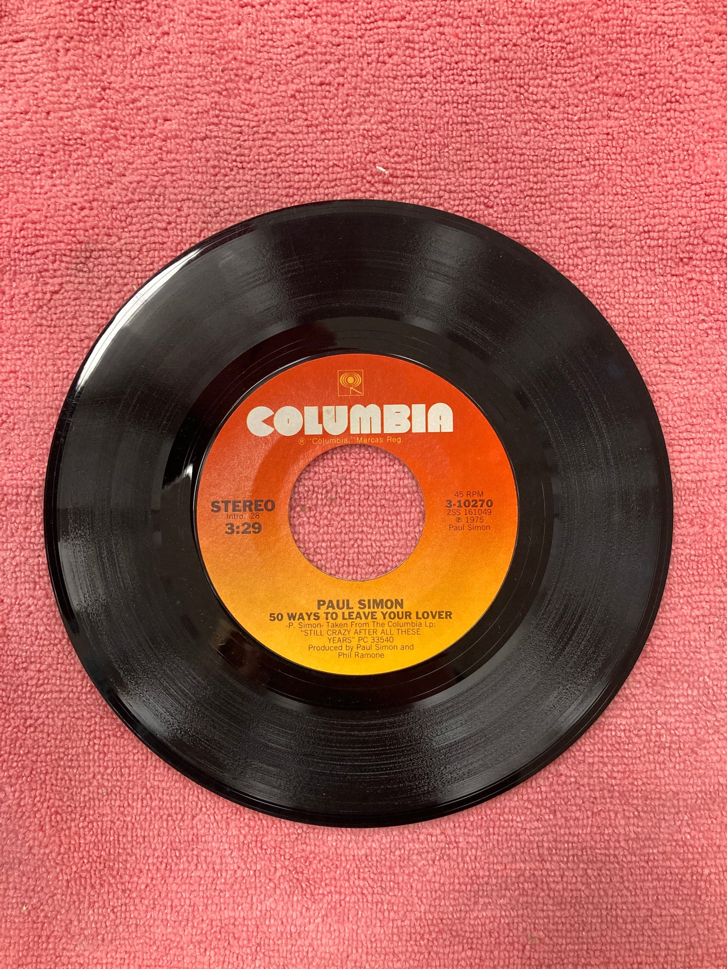 45 double sided record Paul Simon "50 ways to leave your lover" and "Some folks lives roll easy"