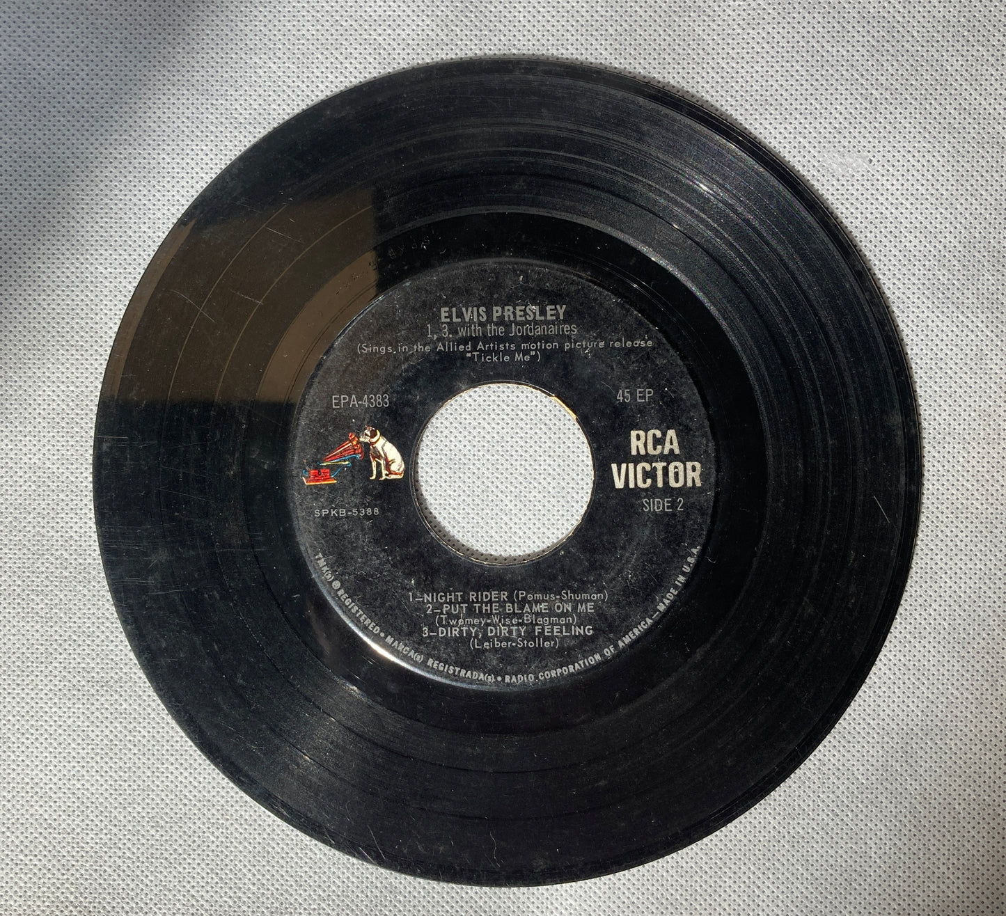 45 double sided Elvis Presley record "I feel that I've know you forever" "Slowly but surely" "Night rider" "Put the blame on me" and "Dirty, dirty feeling"