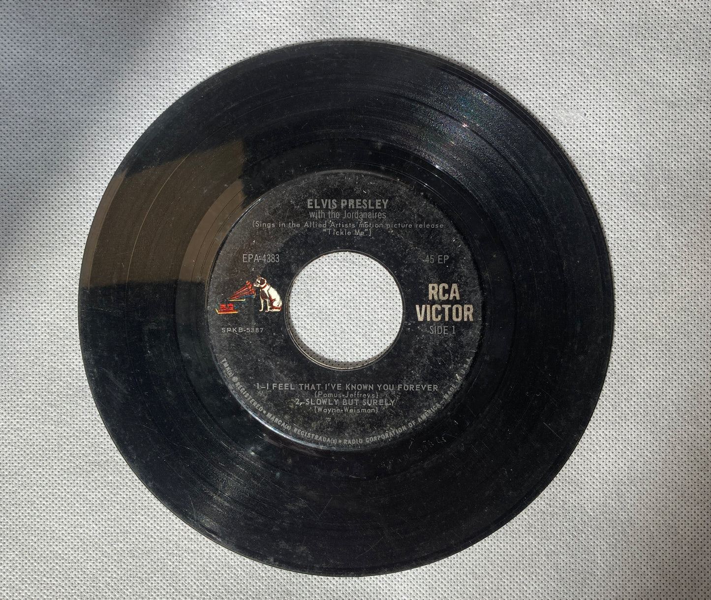 45 double sided Elvis Presley record "I feel that I've know you forever" "Slowly but surely" "Night rider" "Put the blame on me" and "Dirty, dirty feeling"