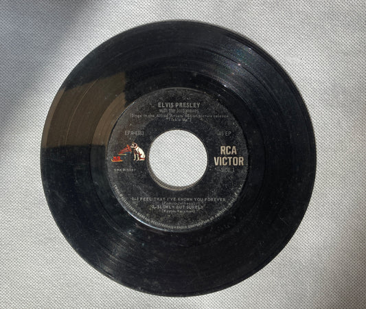 45 double sided Elvis Presley record "I feel that I've know you forever" "Slowly but surely" "Night rider" "Put the blame on me" and "Dirty, dirty feeling"