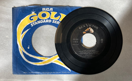 45 double sided Elvis Presley record "Hard Headed Woman" , "Good Rockin' Tonight" , "Don't" , and I Beg of You"