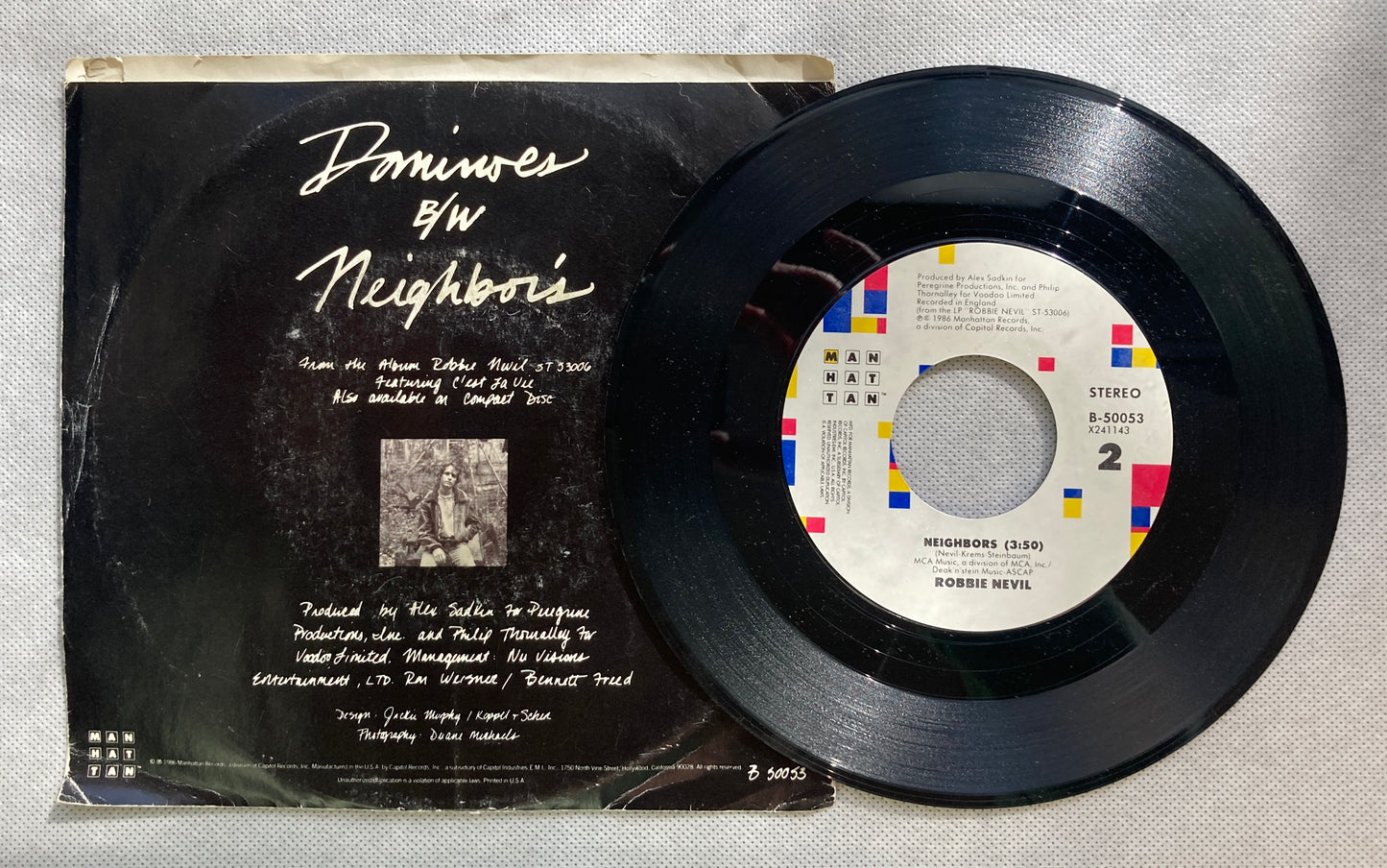 45 double sided Robbie Nevil record "Dominoes" and "Neighbors"