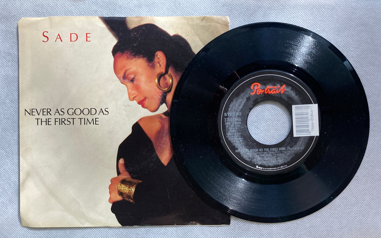 45 double sided SADE record "Never as good as the first time (remix) and "Keep hanging on (live instrumental)"