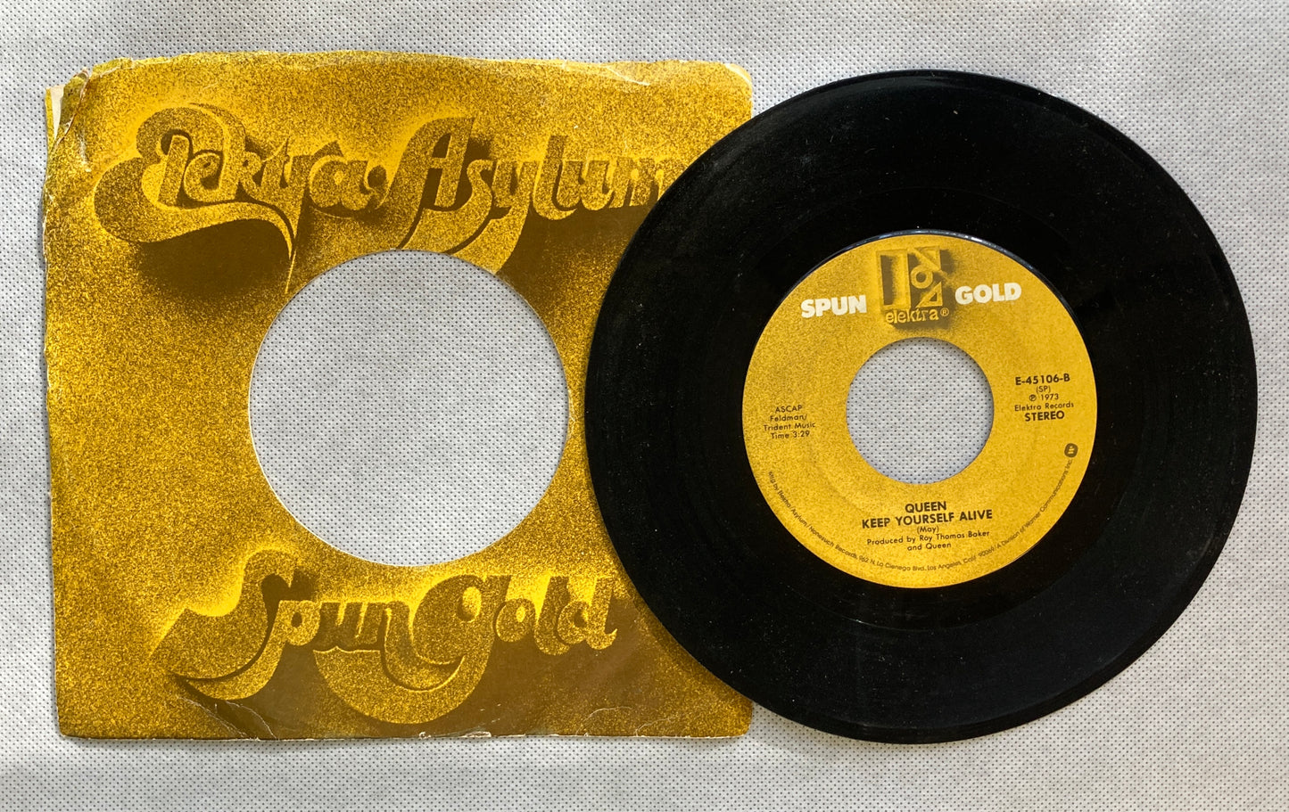 45 double sided Queen record "Another one bites the dust" and "Keep yourself alive"