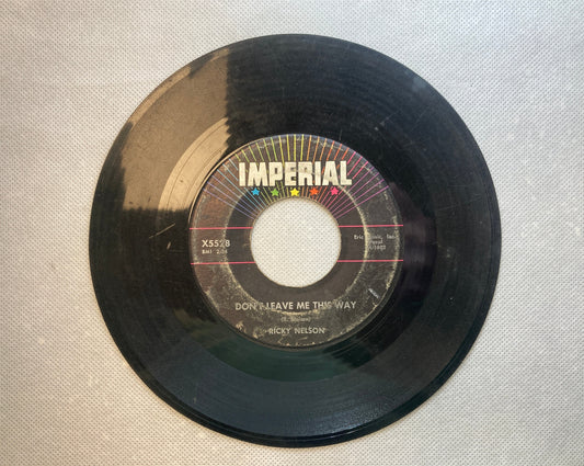 45 double sided Ricky Nelson record "Poor little fool" and "Don't leave me this way"