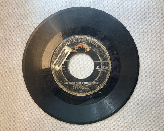 45 double sided Elvis Presley record "All shook up" and "that's when your heartaches begin"