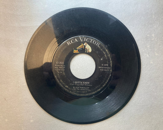 45 double sided Elvis Presley record "I gotta know" and "Are you lonesome tonight"