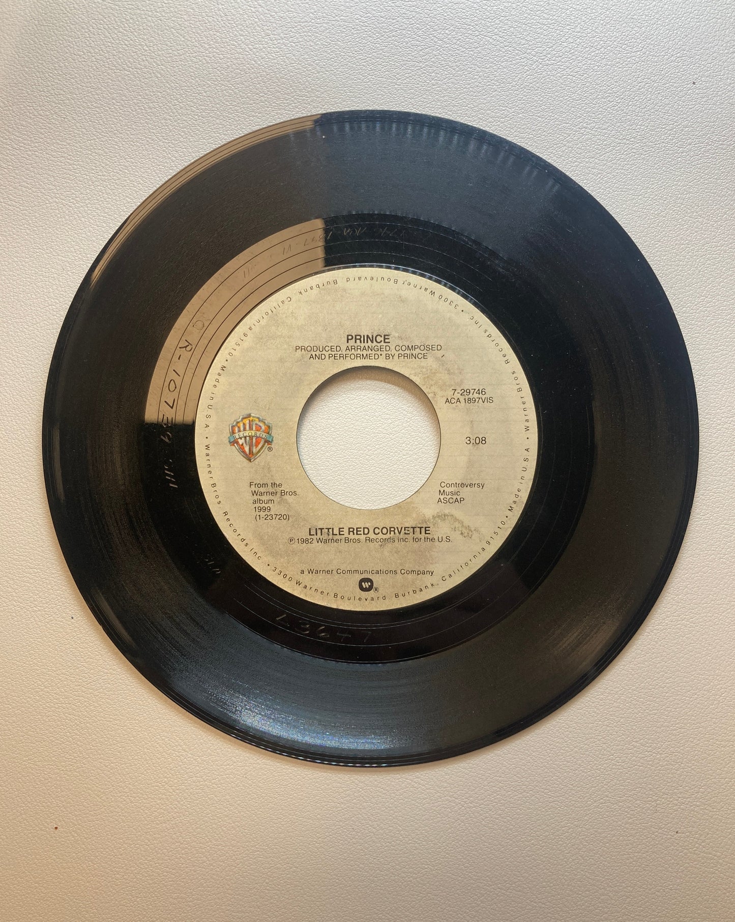 45 double sided Prince record "Little Red Corvette" and "All The Critics Love U In New York"