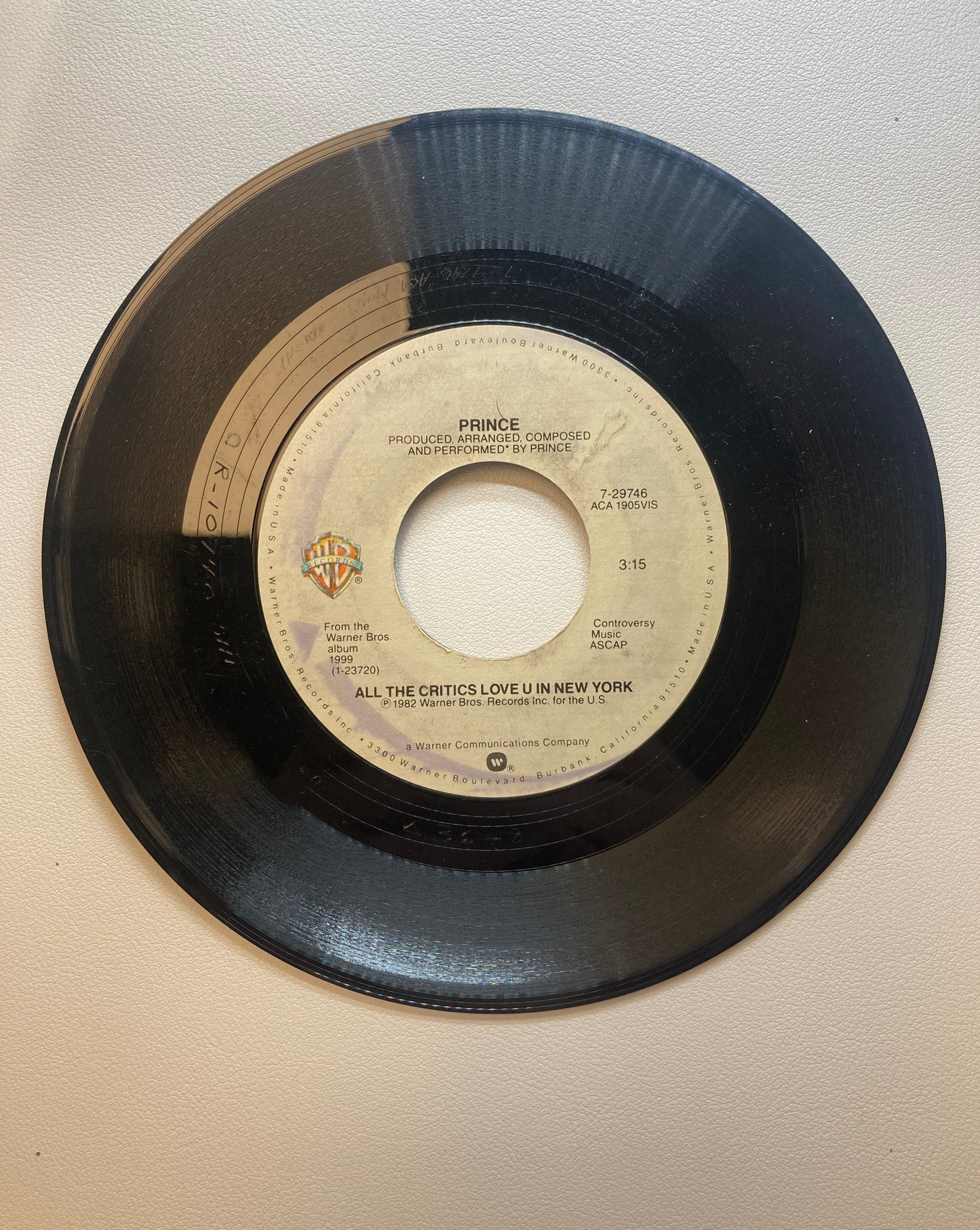 45 double sided Prince record "Little Red Corvette" and "All The Critics Love U In New York"