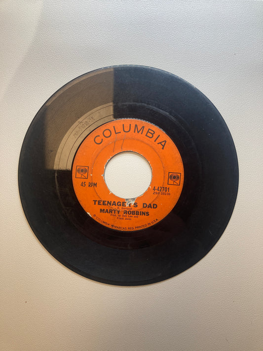 45 double sided Marty Robbins record "Teenage Dad" and "Cigarettes and Coffee Blues"