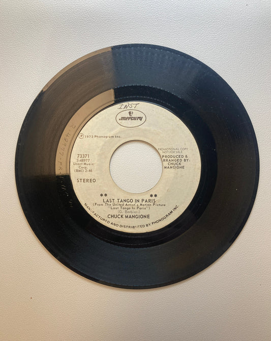 45 double sided Chuck Mangione record "Last tango in Paris" and "Legend of he one eyed sailor"