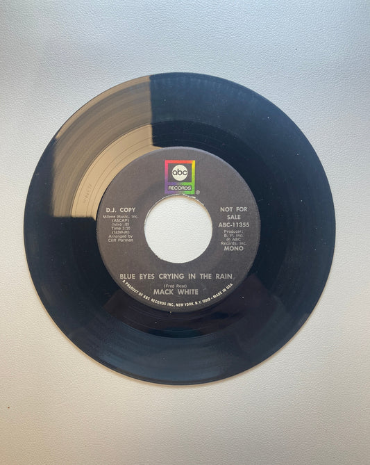 45 single sided Mack White record "Blue eyes crying in the rain"