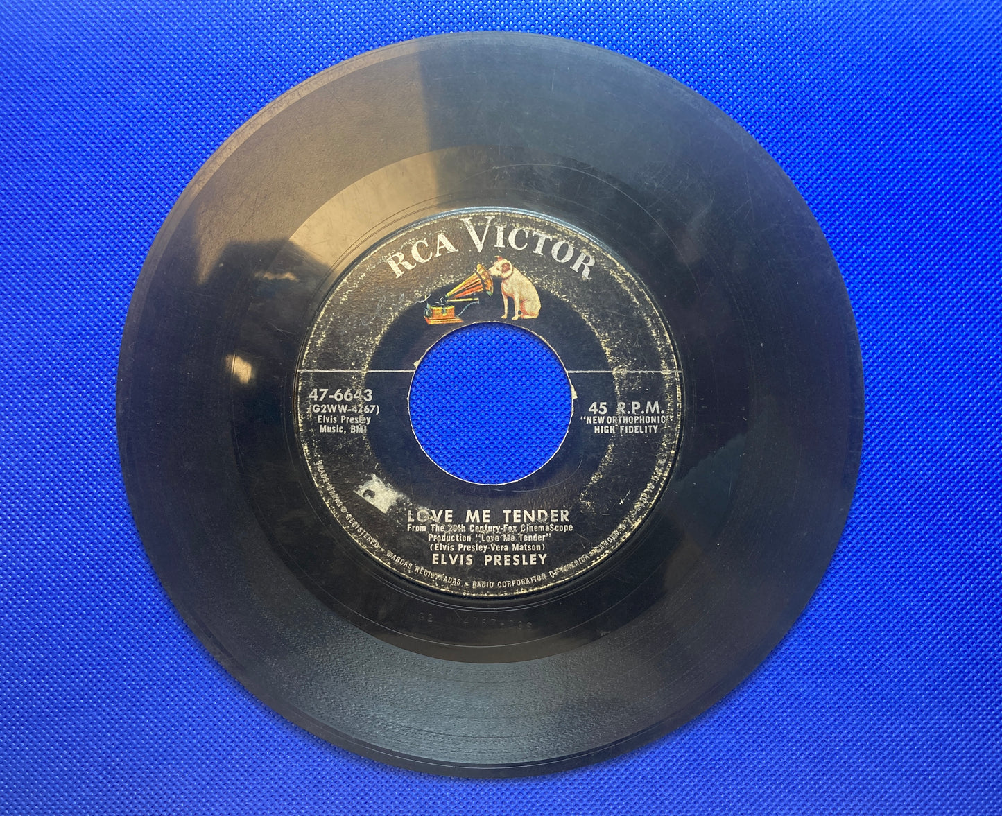 45 double sided Elvis Presley record  "Love me tender" and "Anyway you want me"