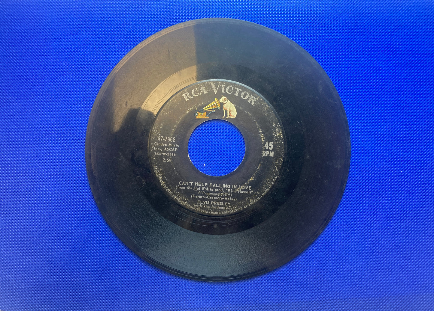 45 double sided Elvis Presley record "Can't help falling in love" and "Rock a hula baby"