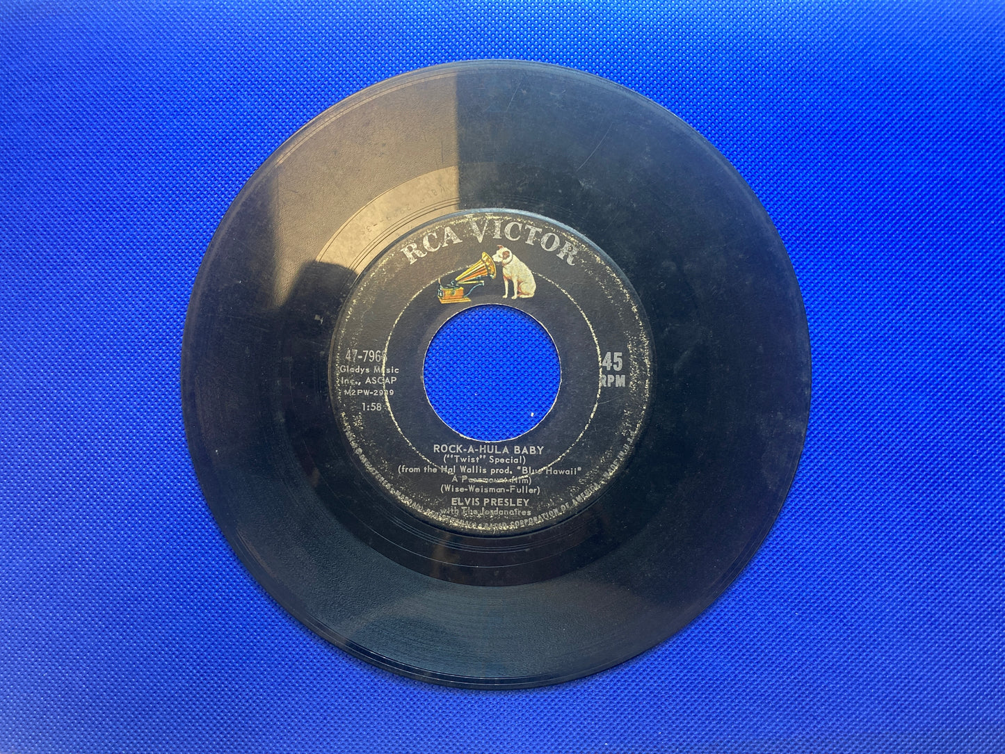 45 double sided Elvis Presley record "Can't help falling in love" and "Rock a hula baby"