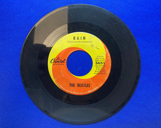 45 double sided The Beatles record "Rain" and "Paperback Writer"