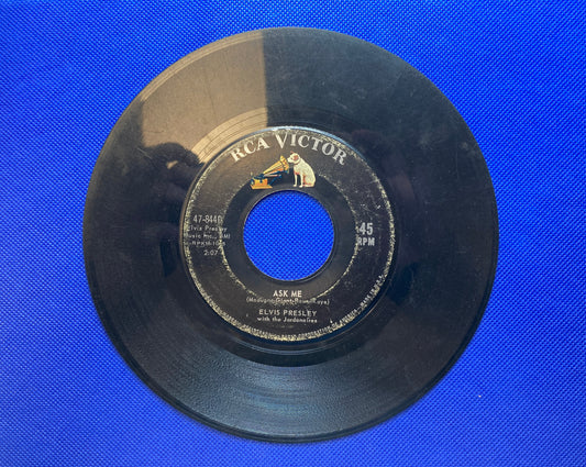 45 double sided Elvis Presley record "Ask Me" and "Ain't That Loving You Baby"