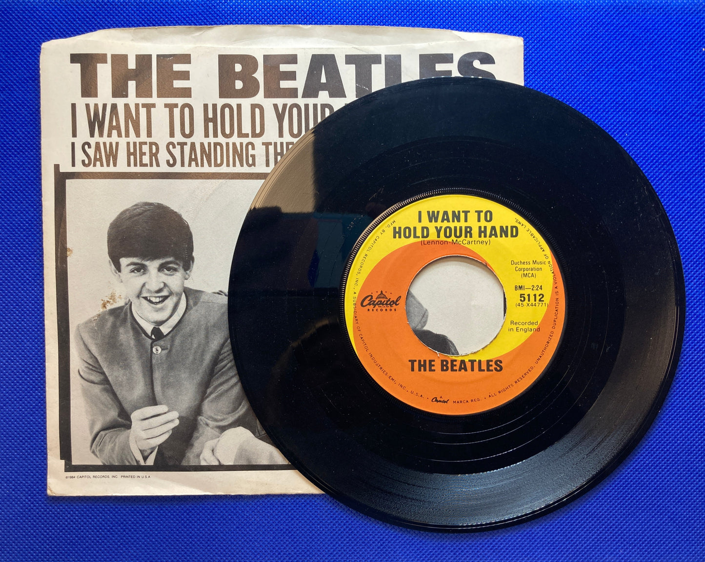 45 double sided The Beatles record "I want to hold your hand" and "I saw her standing there"