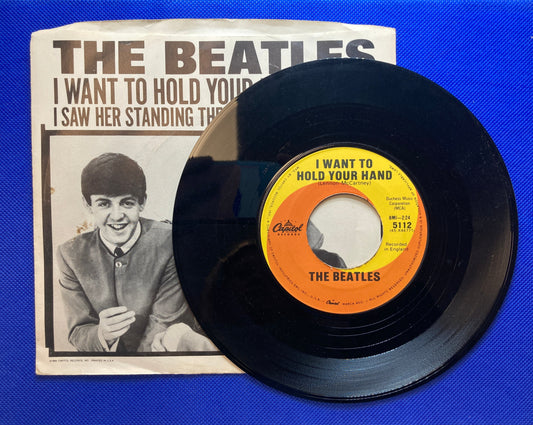 45 double sided The Beatles record "I want to hold your hand" and "I saw her standing there"