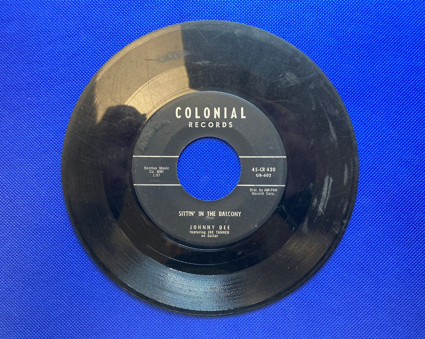 45 double sided Johnny Dee record "Sittin' in the balcony" and "A plus in love"