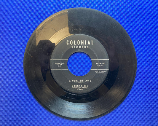 45 double sided Johnny Dee record "Sittin' in the balcony" and "A plus in love"