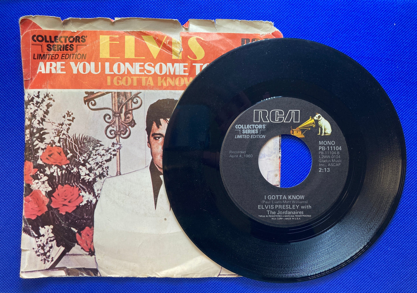 45 double sided Elvis Presley record with sleeve "I gotta know" and "Are you lonesome tonight"