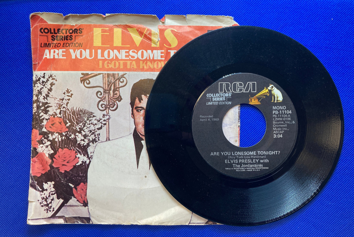 45 double sided Elvis Presley record with sleeve "I gotta know" and "Are you lonesome tonight"