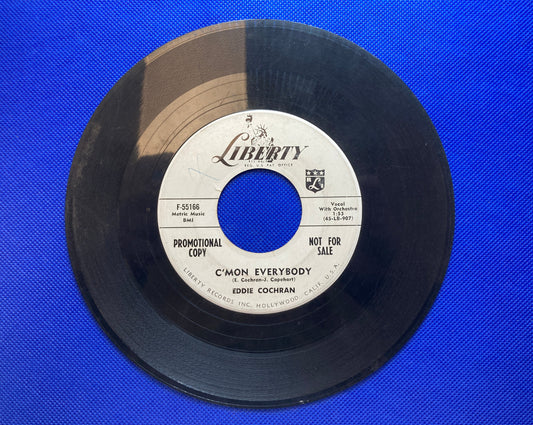 45 double sided Eddie Cochran record C'mon Everybody" and "Don't ever let me go"