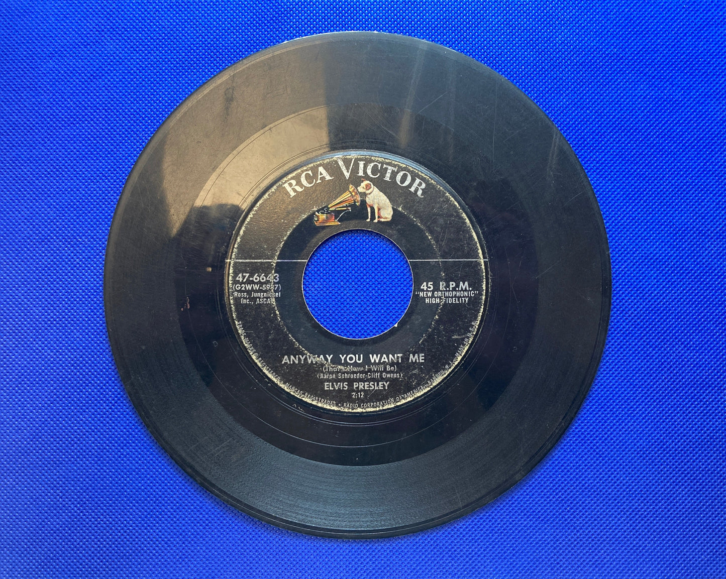 45 double sided Elvis Presley record "Loving You" , "Party" , "Teddy Bear" and "True Love"