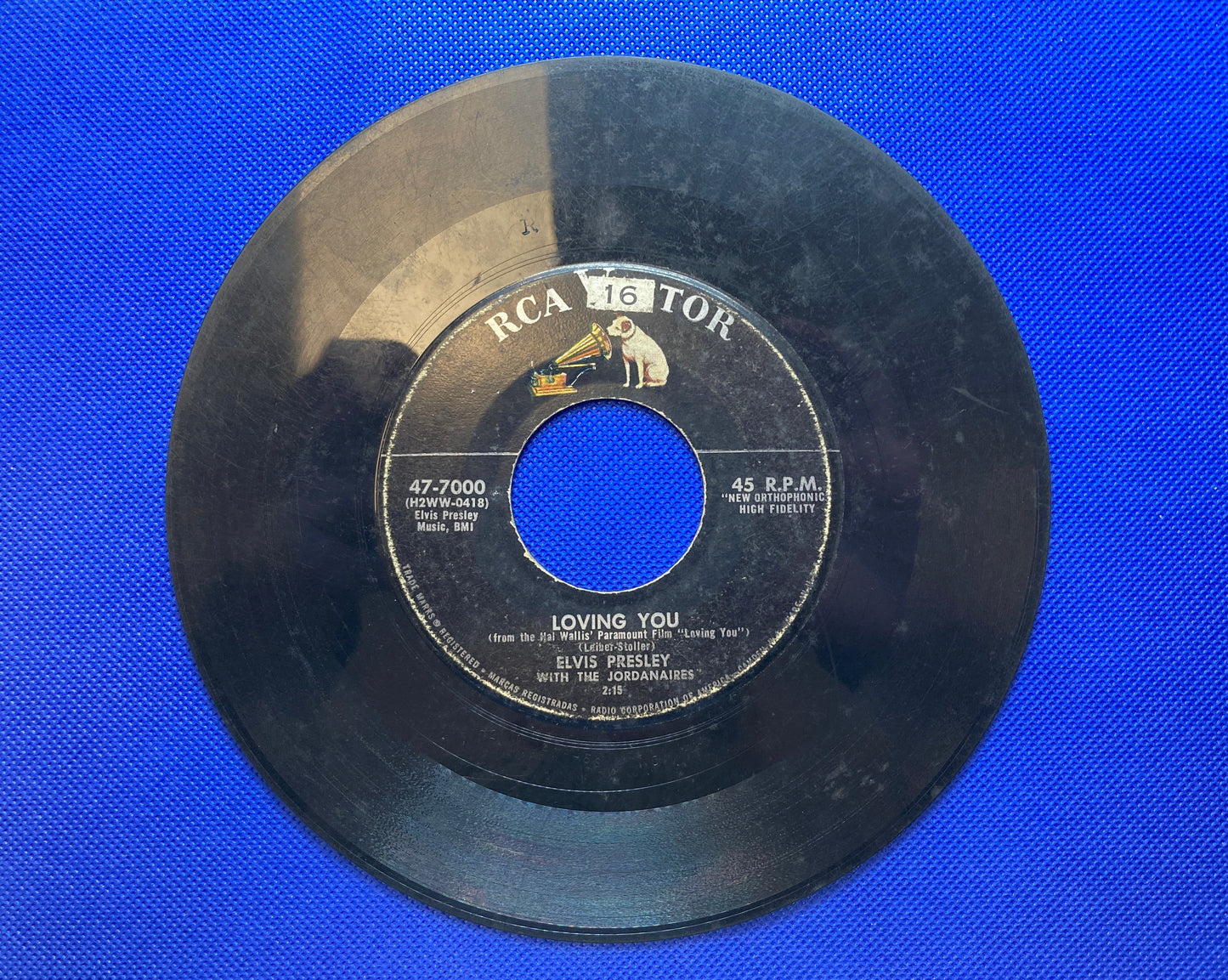 45 double sided Elvis Presley record "(Let me be your teddy bear" and "Loving you"