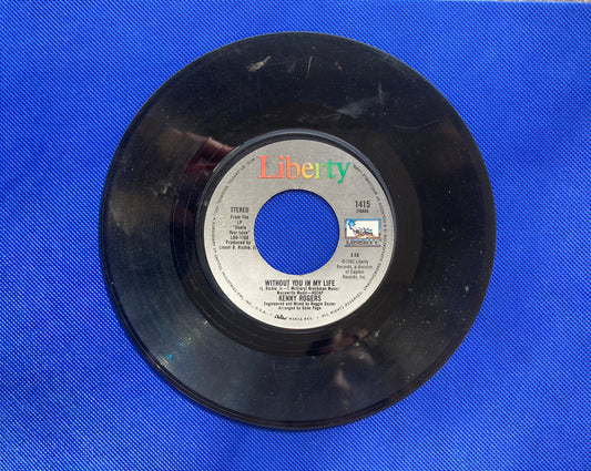 45 double sided Kenny Rogers record "Without you in my life" and "I don't need you"