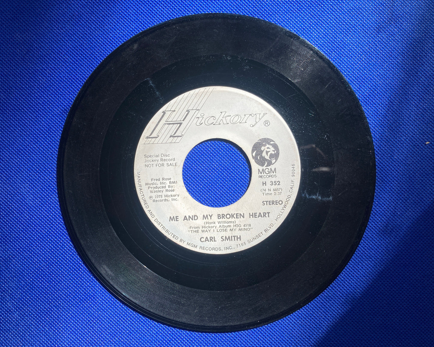 45 double sided Carl Smith record "Me and my broken heart" and "The girl I love"