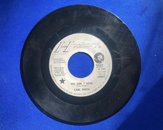 45 double sided Carl Smith record "Me and my broken heart" and "The girl I love"