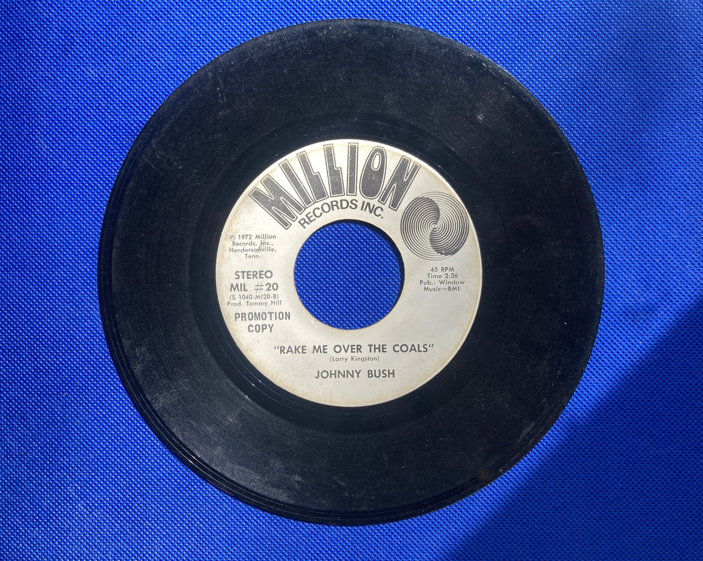 45 single sided Johnny Bush record "Rake me over the coals"