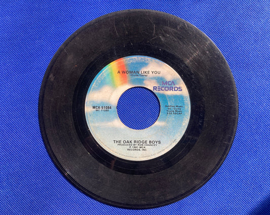 45 double sided The Oak Ridge Boys record "A woman like you" and "Elvira"