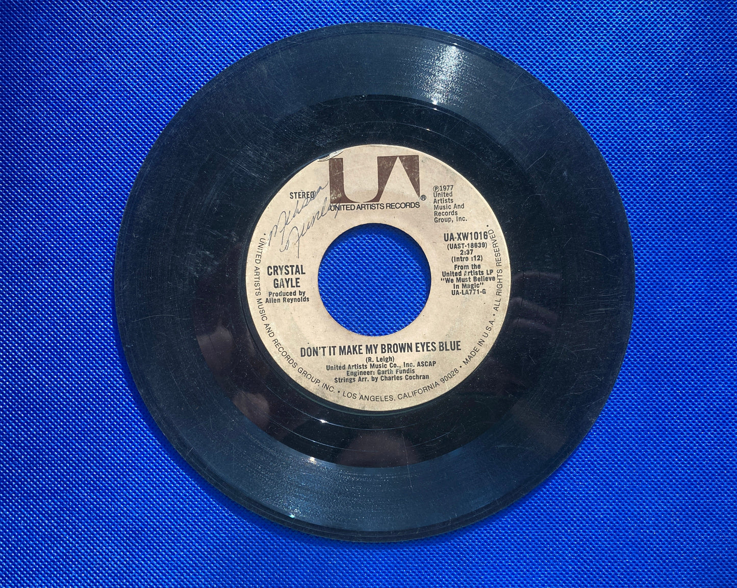 45 double sided Crystal Gayle record "It's all right with me" and "Don't it make my brown eyes blue"