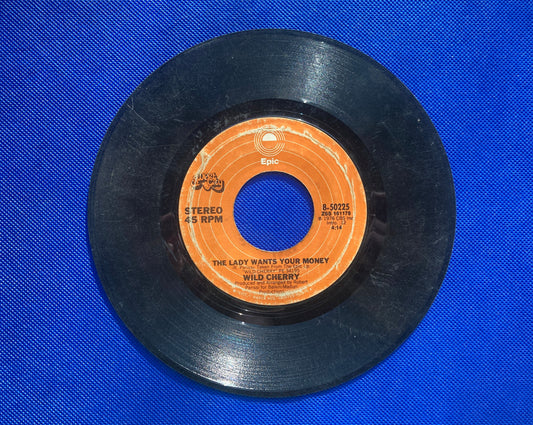 45 double sided Wild Child record "The lady wants your money" and "Play that funky music"